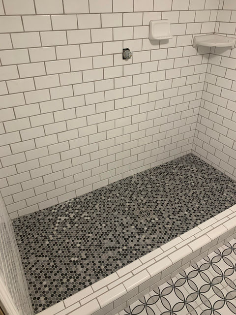 Elegant subway tile bathroom